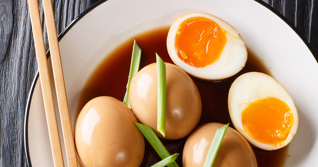 Soy-Marinated Eggs with Yolks in Bowl